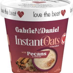 A container of Omega instant oats with pecans and spices, displayed in a red and white cup with a heart-patterned lid.