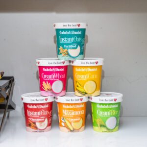 Five buckets of ice cream making a triangle by staking on each other.